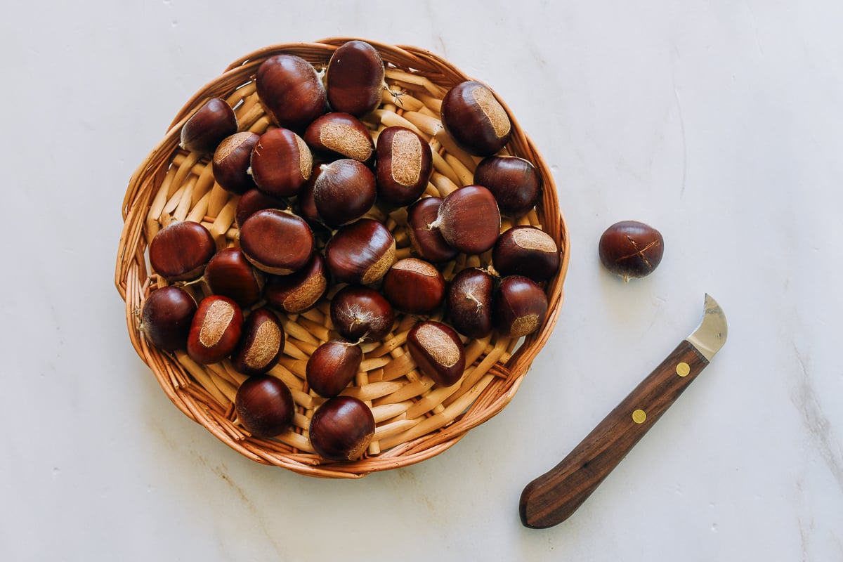 basket of chestnuts with chestnut knife