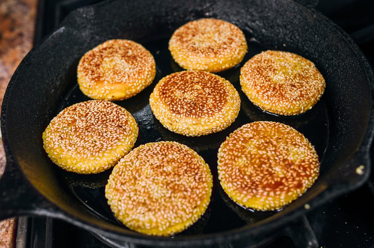 chinese pumpkin cakes cooking in pan