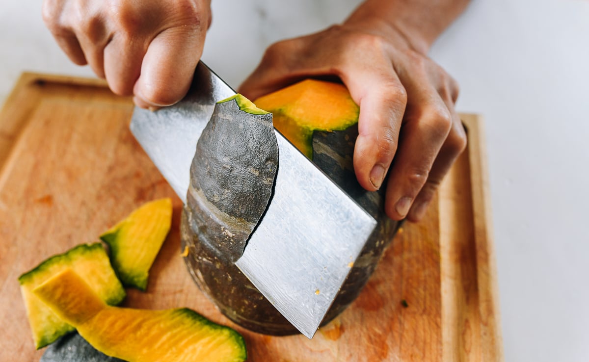 Cutting skin off of pumpkin