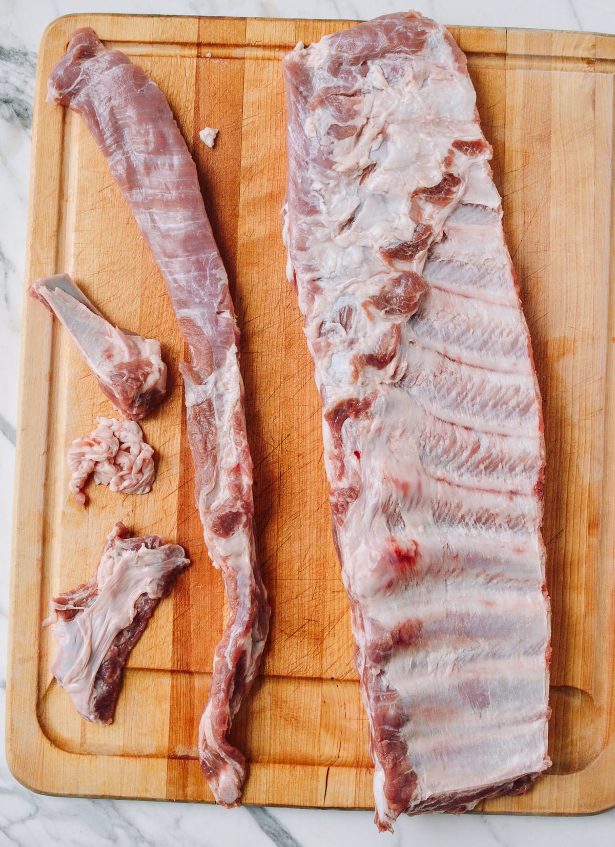 rib tips and breast bone removed from spare ribs to make st. louis cut