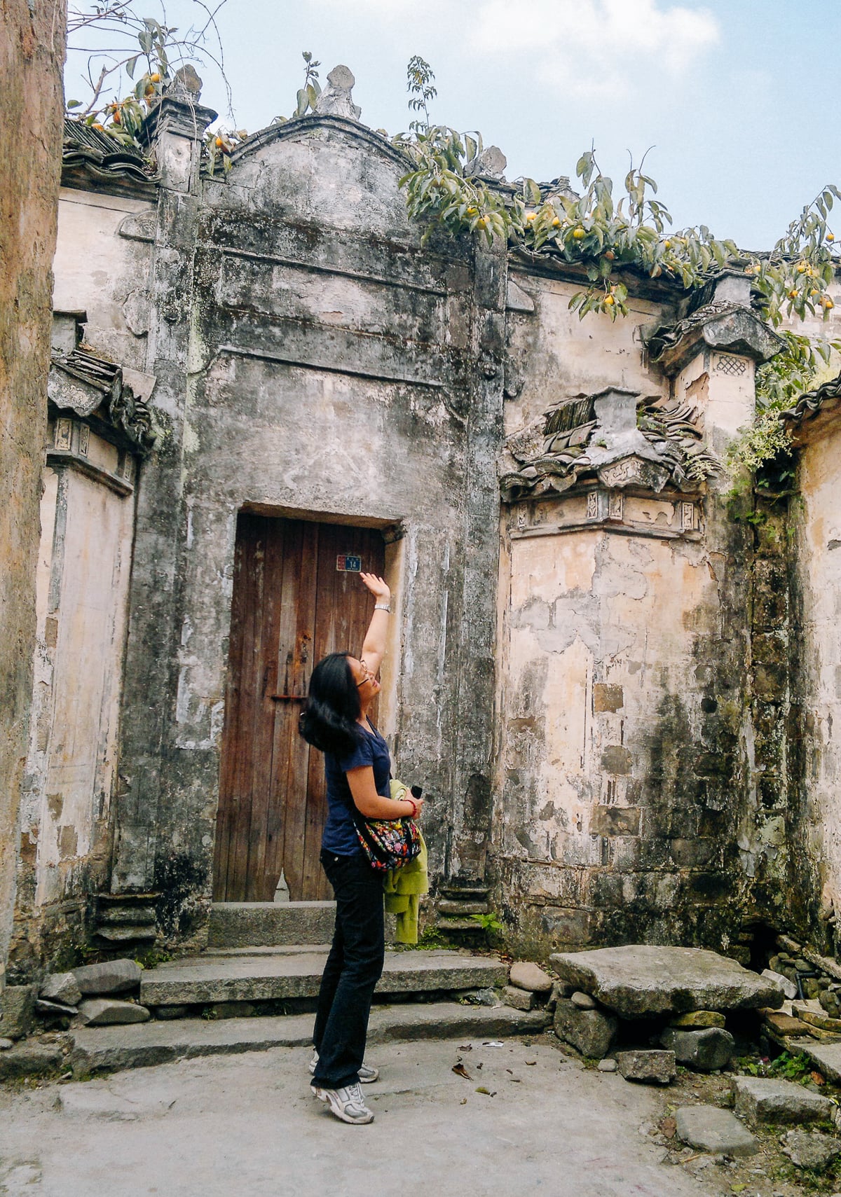 judy pointing out fruit trees