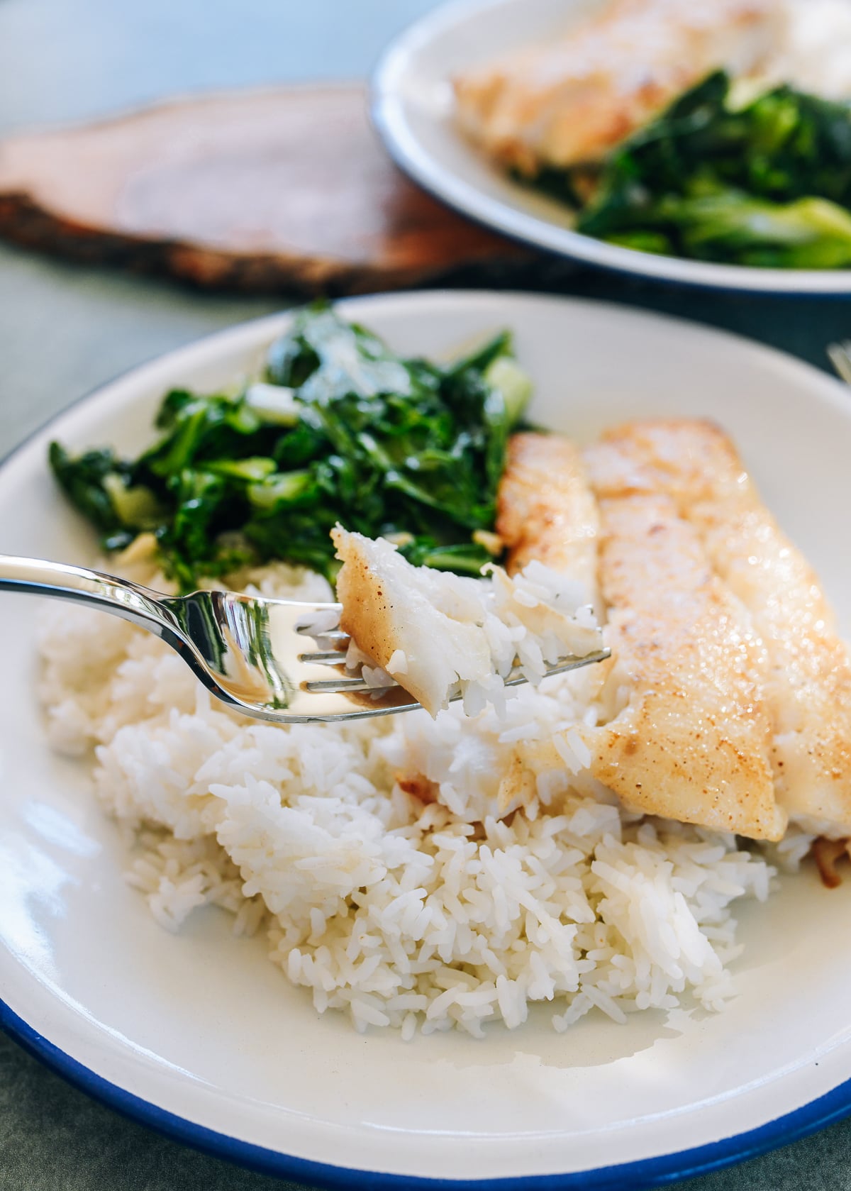 a forkful of pan-fried cod