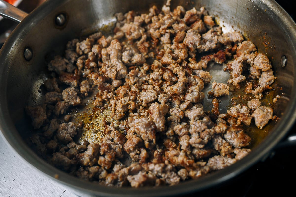 browned ground pork in skillet