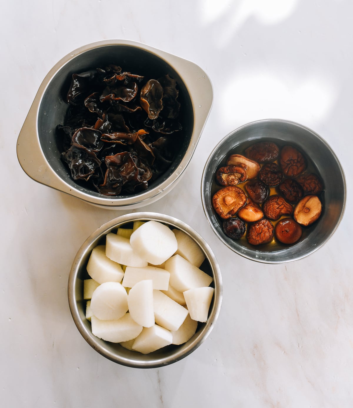 reconstituted wood ears, shiitakes, and daikon radish