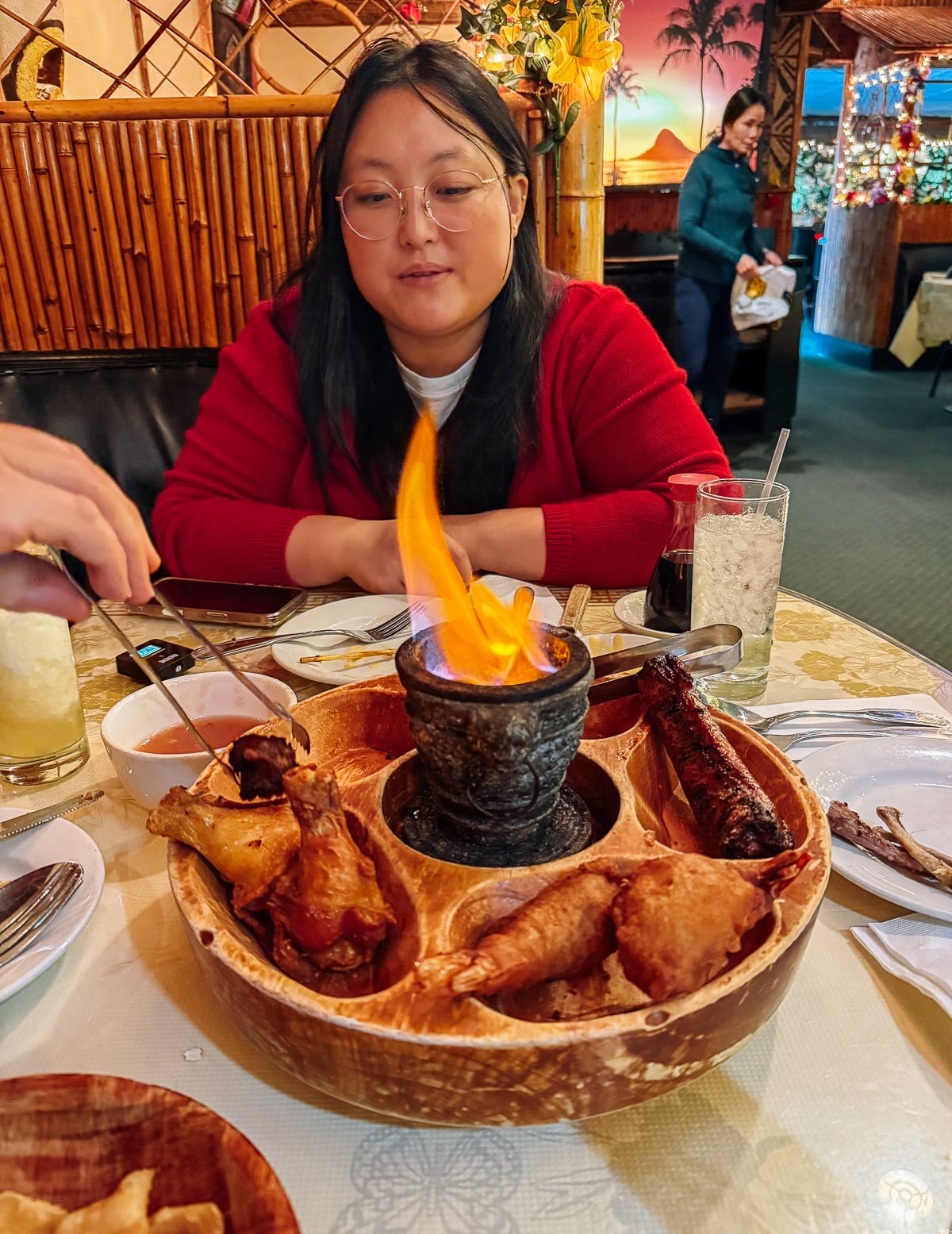 Kaitlin with pupu platter at Lee's Hawaiian Islander