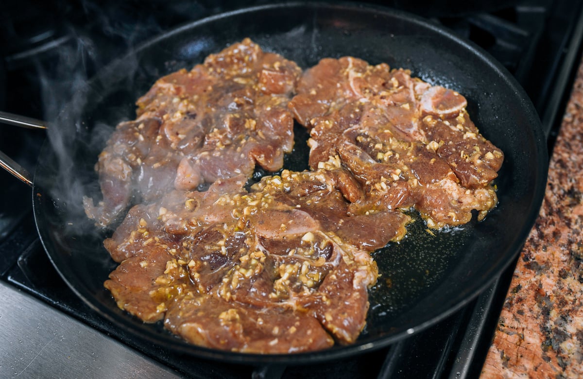 cooking vietnamese pork chops in skillet