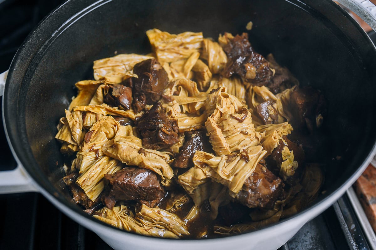 beef stew with dried bean curd sticks in dutch oven
