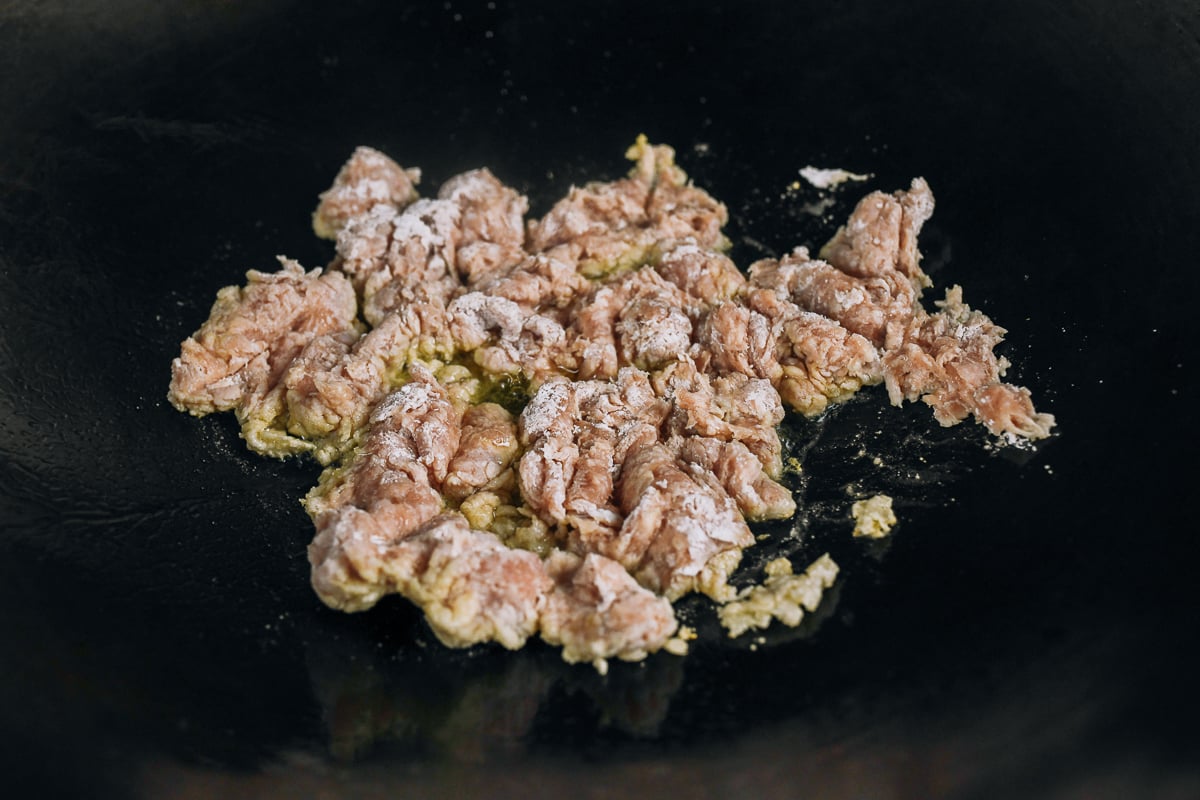 searing ground chicken in wok