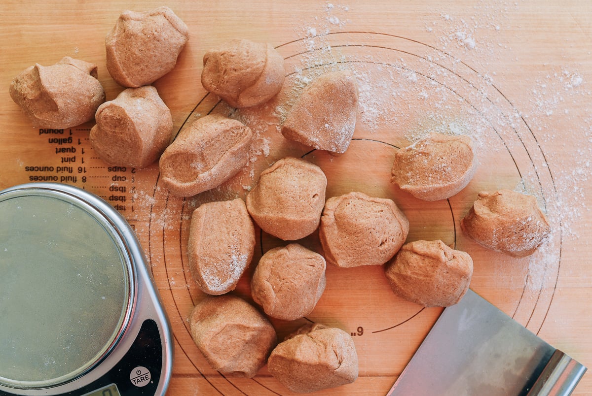15 dough pieces on cutting board