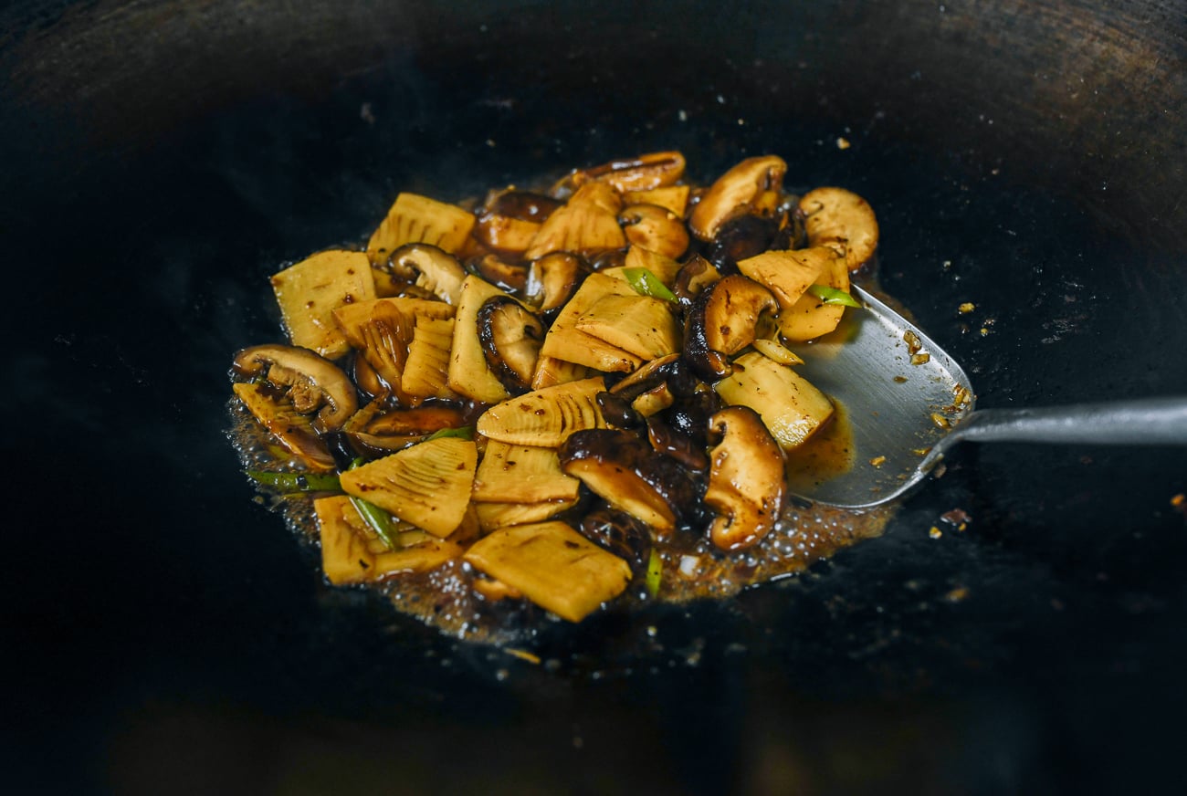 chinese braised bamboo and mushrooms in wok