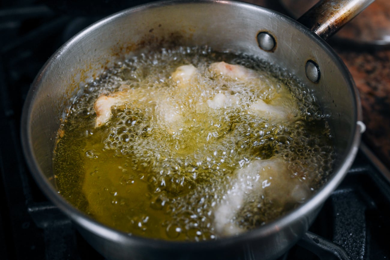 battered shrimp in hot oil