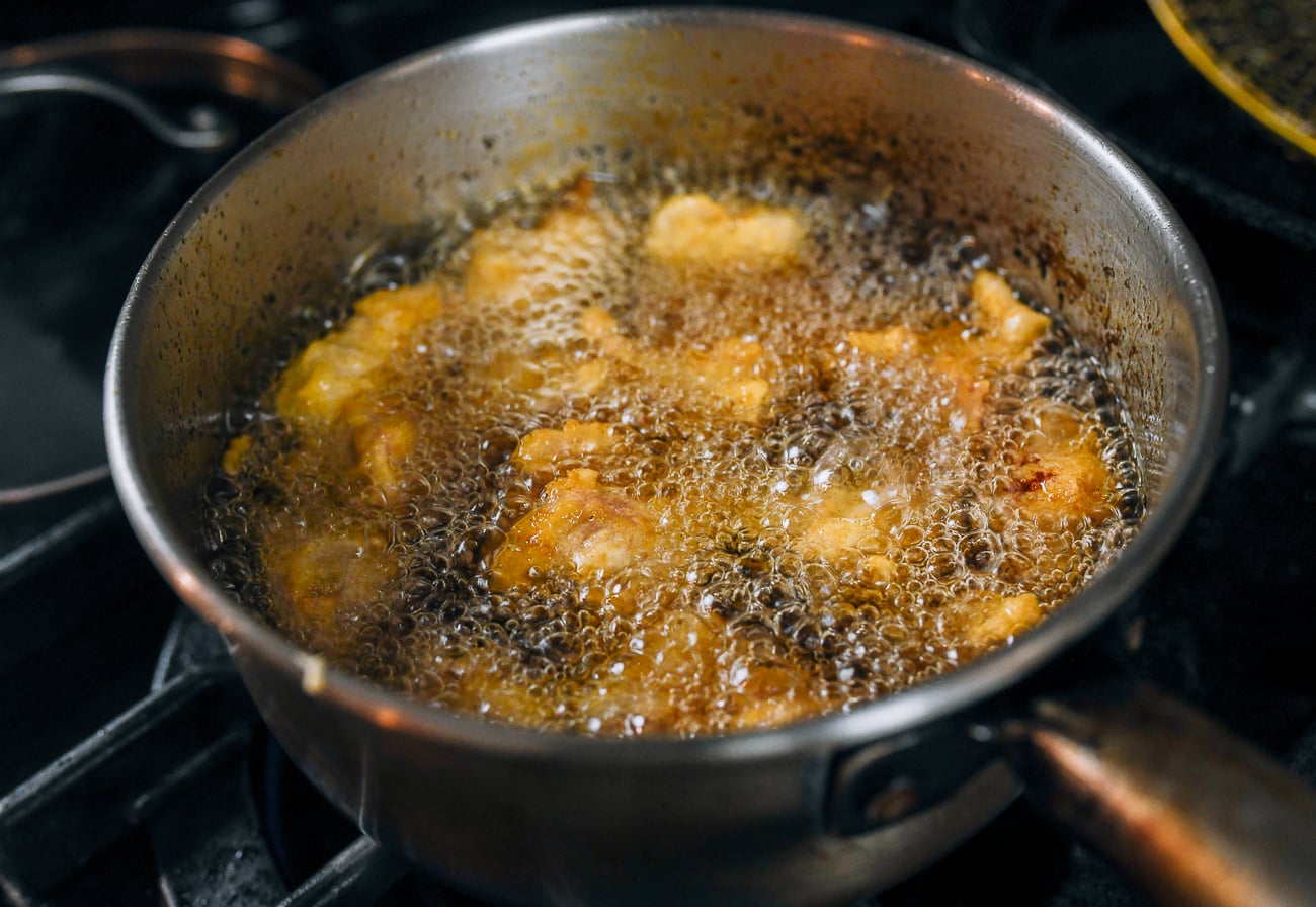 deep-frying chicken pieces