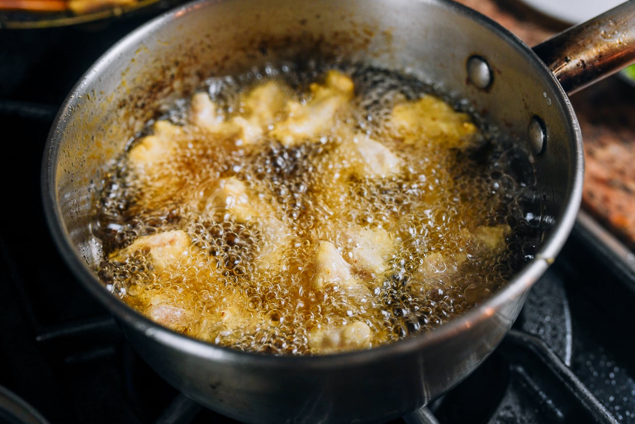 frying chicken pieces in oil