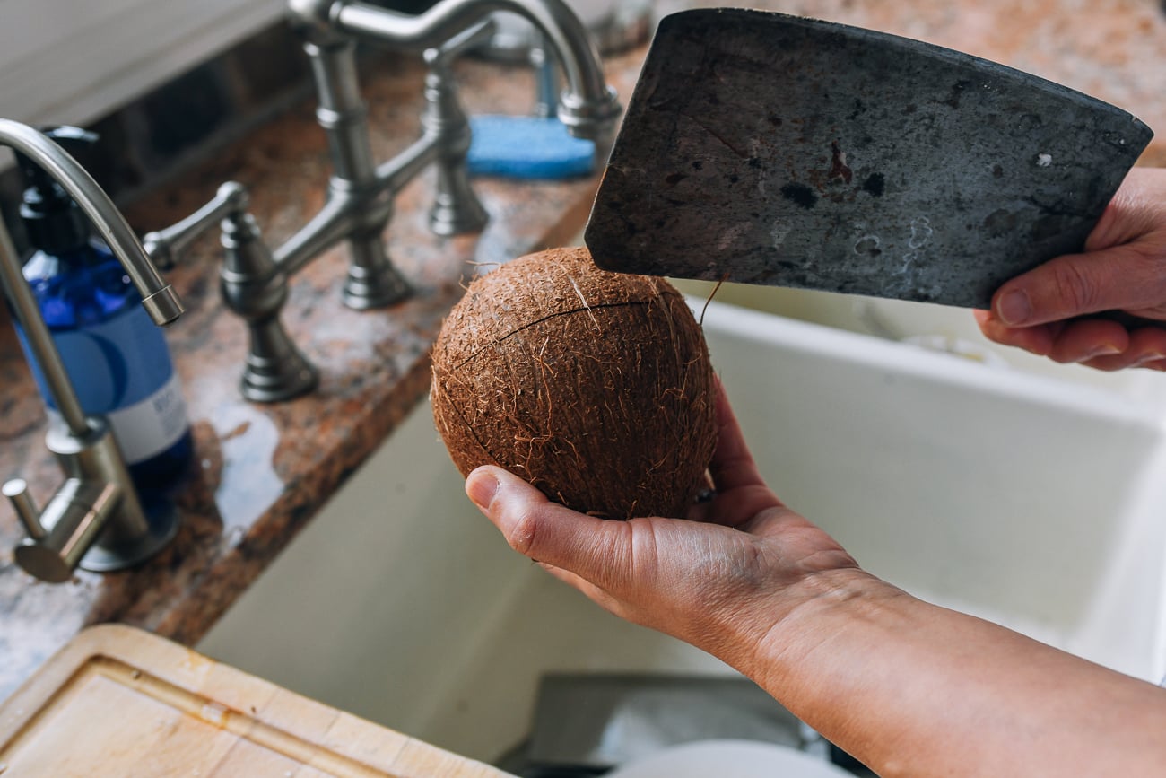 cracked mature coconut from smacking it with a cleaver