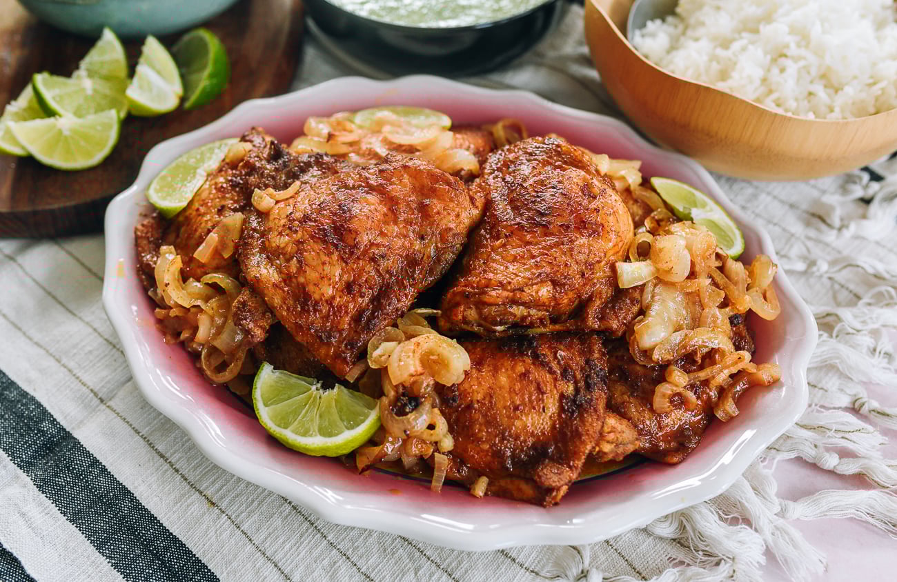 sheet pan peruvian chicken served on a plate