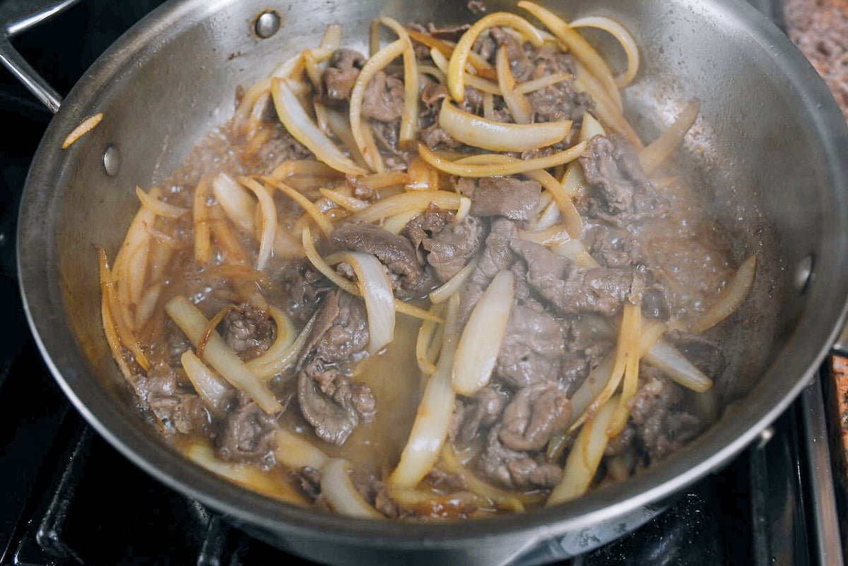 beef and onions cooking together